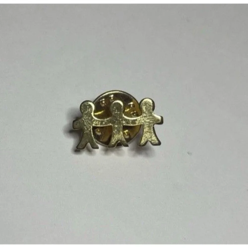 Gold Tone Children Of Hope Pin